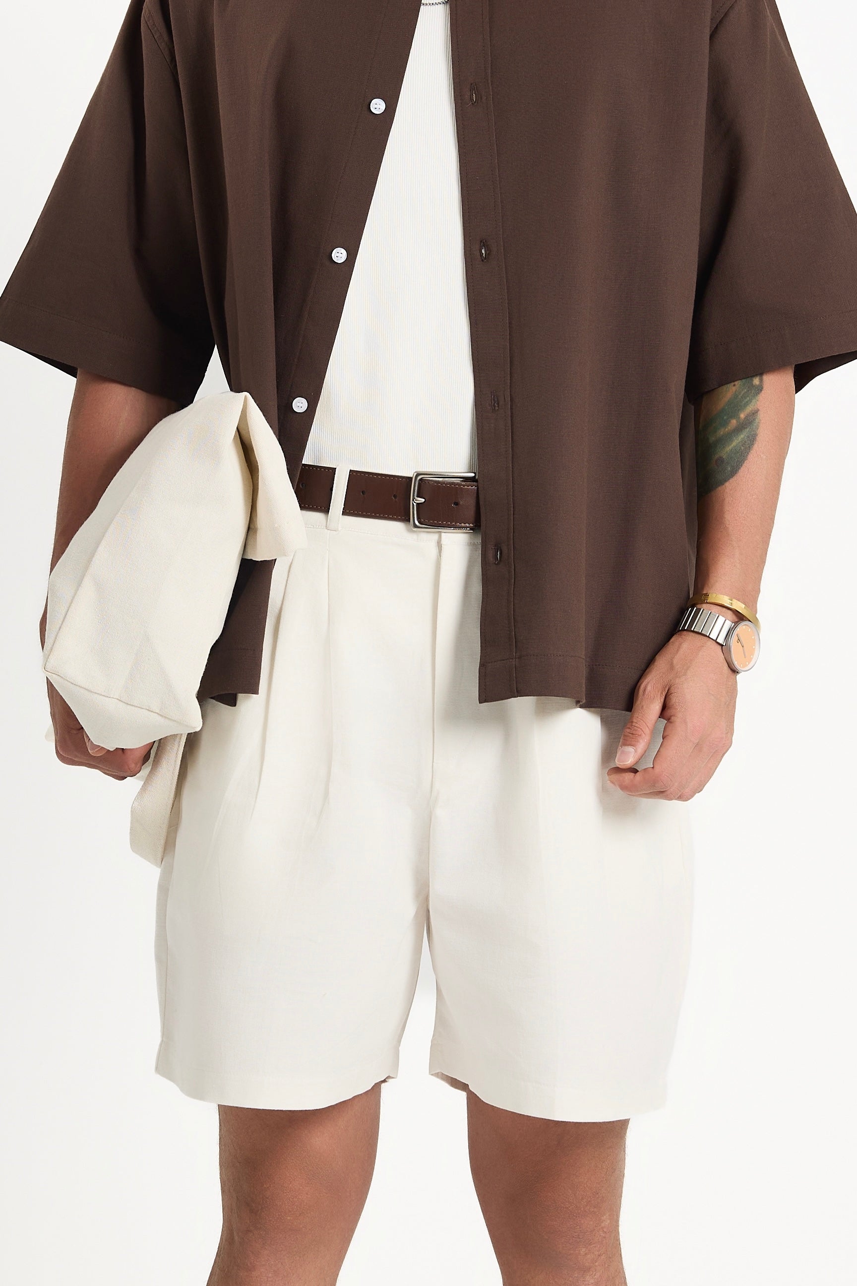 Off-white pleated linen shorts